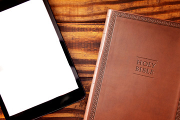 A Tablet with a Bible for LIve Streaming Church Services or Bible Study