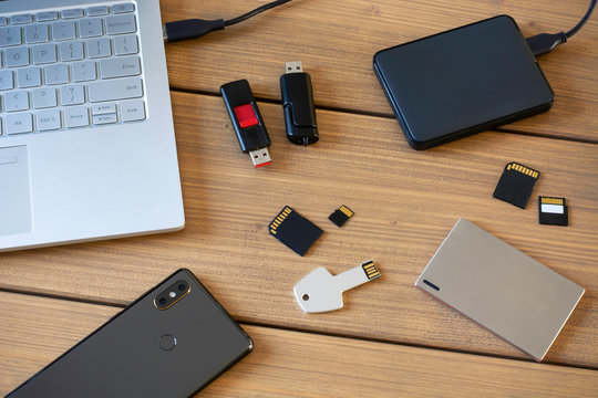 Various digital data storage devices. Usb sticks, external hard drive, SD cards, mini and micro SD cards, laptop and smartphone 