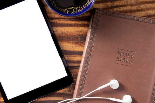 A Tablet With A Bible For LIve Streaming Church Services Or Bible Study