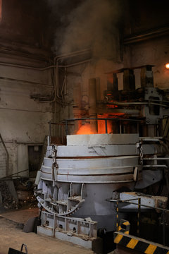 Furnace emitting smoke on factory