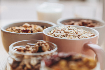 homemade granola for breakfast and the ingredients from which it is prepared, top view