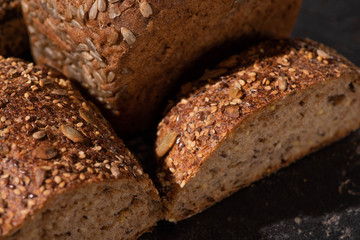 close up view of fresh baked brown whole grain bread