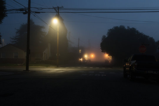 Foggy morning intersection in a small rural town