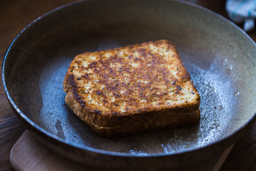 Photo of grilled cheese lying in a pan
