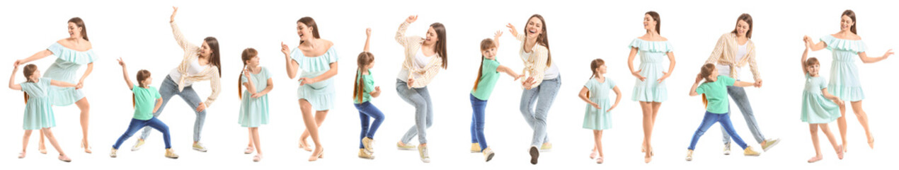 Happy mother and her little daughter dancing against white background
