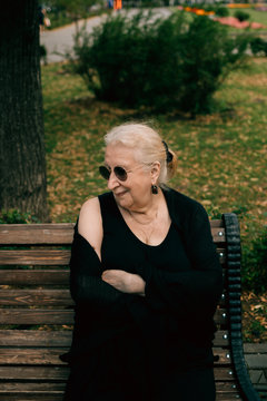 Happy senior woman in the park