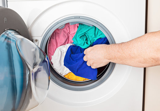 Washing Or Drying Machine Loaded With The Laundry. Washing, Spring Cleaning Idea