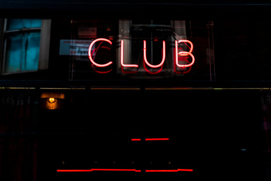 Neon sign out of a bar