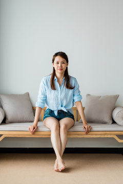 Portrait of Asian woman at home