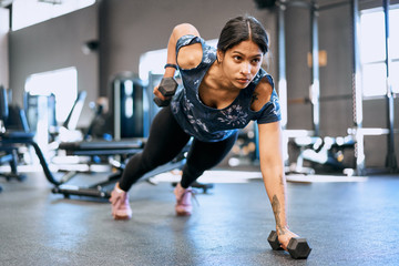 Fit woman working out in a gym