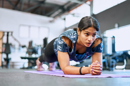 Fit woman working out in a gym