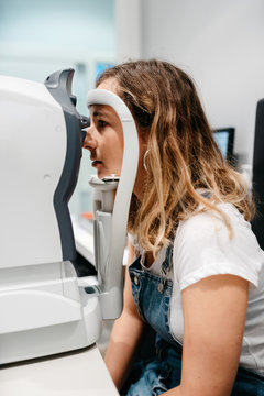 Oculist checking patient's eyes pressure, tonometry