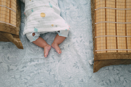 Baby sleeping at home in summer