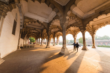 Red fort Agra, UNESCO World Heritage site in the city of Agra India. Historic red sandstone fort of medieval India at sunrise.