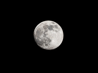 Full moon on black sky background