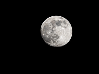 Full moon on black sky background
