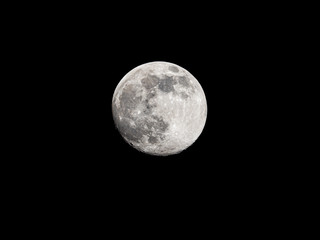 Full moon on black sky background