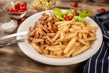 Greek gyros dis with fries and salad