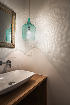 Glass pendant light in a bathroom