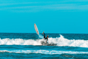 surfer fall down in the sea - obrazy, fototapety, plakaty