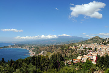 Italy - Sicily - Roman historic  greek theater in syracuse and view of Etna volcano with snow 