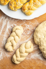 Unbaked braided bun dough. Raw dough.