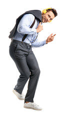 Cool young man listening to music and dancing against white background