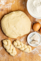 Unbaked braided bun dough. Raw dough.