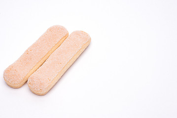 Savoyardi biscuit cookies or ladies' fingers isolated on white background