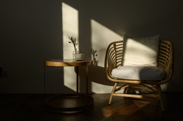 a table and chair made of bamboo in the sunshine cozy homely atmosphere