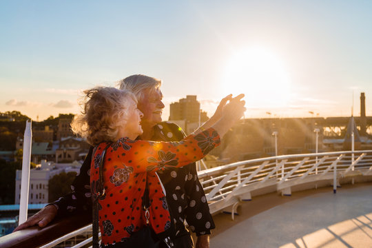 senior couple taking a photo on a cruise