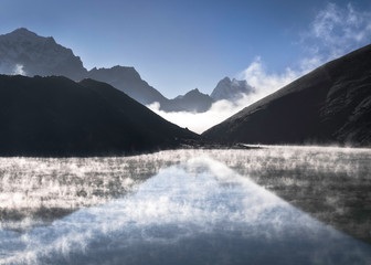 Morning Fog Clings to Gokyo Lake in the Himalayas