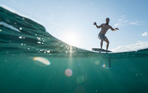 Man foil surfing, Costa Rica