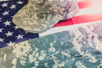 US flag with US military uniform over it - studio shot.