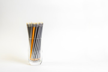 Simple pencils for office workers. Pencils for drawing. The pencils are in the glass.