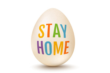 White egg for Easter with text stay home