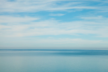 blue ocean waves and sky clouds summer background