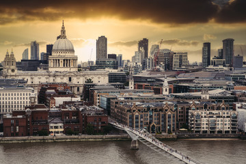 Aerial view of London at sunset with St Paul Cathedral at sunset
