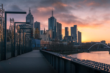 Melbourne cityscape at sunrise with Melbourne CBD skyscrapers and Southbank