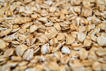healthy oat flakes background, rolled oat, oat flakes texture