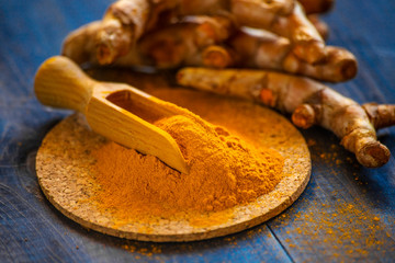 Turmeric root and powder spice. Natural antioxidant