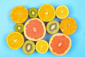 Citrus fruits background flat lay