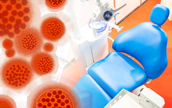 Image Of A Virus Over A Dental Chair. Concept - Non-sanitized Dentist Tools. Concept - Infection Of The Teeth With A Dentist’s Tools. Patient Has Contracted A Virus From A Dentist. Doctor Negligence