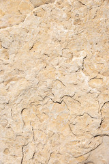 yellow stone background with random abstract shapes