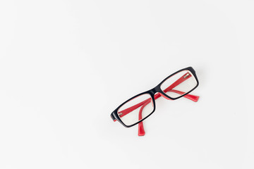 Modern eyeglass isolated on white background. single black and red eyeglasses.Glasses on white...