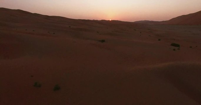 4K Epic Drone Shot Flying Over Red Desert Sand Dunes