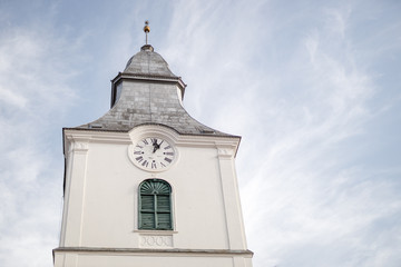 church steeple against blue sky