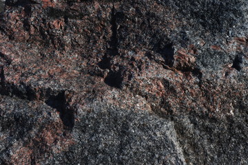 Stone wall as a background.Decorative natural stone. Natural decoration of the facade of the house, building