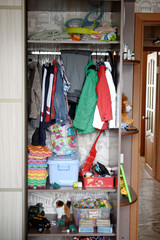 children's wardrobe with clothes and toys.