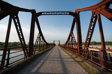 Fototapeta na wymiar Rusty bridge on route 11 of Buenos Aires
